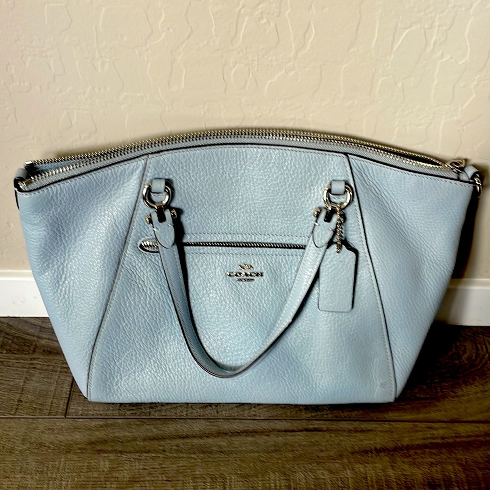 Light blue Coach purse.